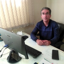 بررسی هرس درختان مرکبات توسط عضو هیات علمی پژوهشکده مرکبات و میوه‌ های نیمه‌ گرمسیری